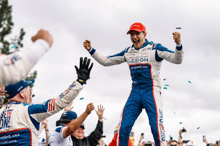 Alex Palou celebrates after winning his second IndyCar championship in the last three seasons. IndyCar photo by Joe Skibinski.